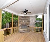 Covered Porch w Outdoor FP  in home built by Atlanta Home Builder Waterford Homes
